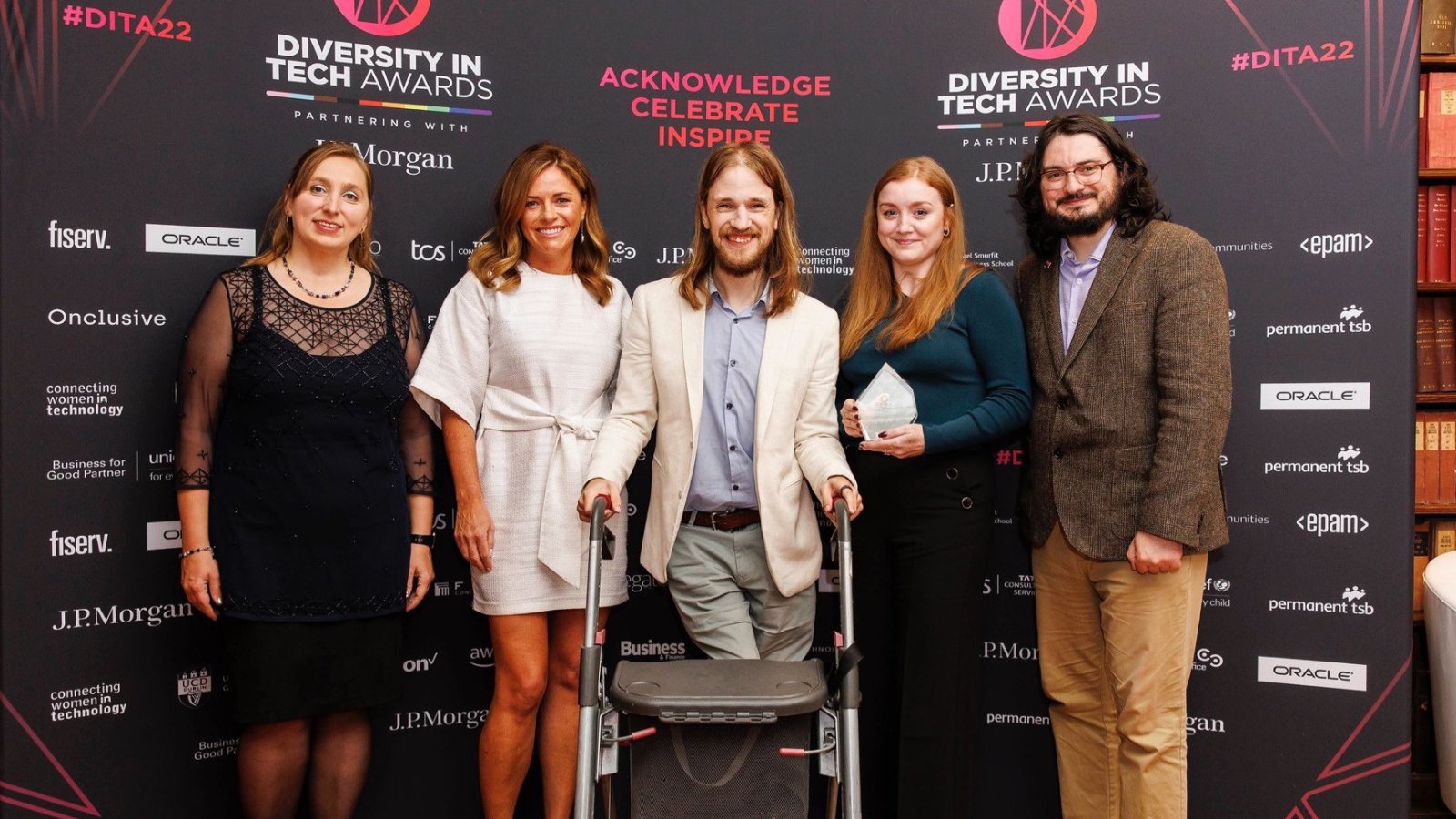 Amy Donal and Matt winning the Social Impact Award at the 2022 Diversity in Tech Awards